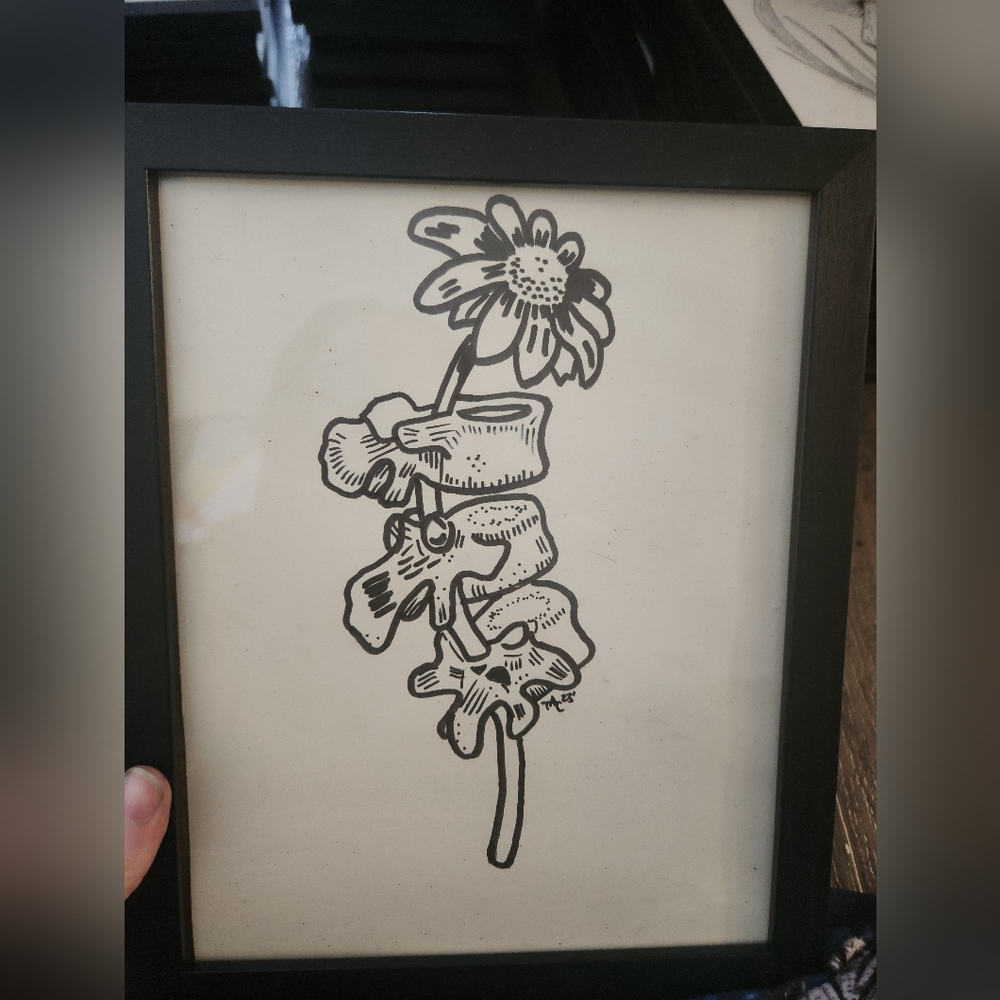 Pen and ink daisy vertebrae art